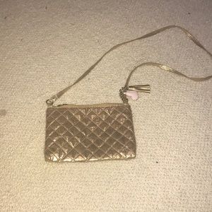 Gold purse with tassel